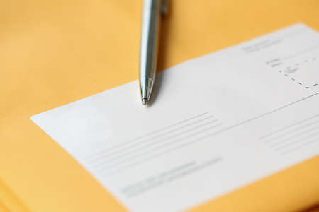 Envelope with address recipient note on parcel box for send to customersの写真素材