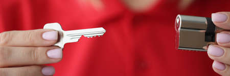 Blonde female agent in red shirtの写真素材