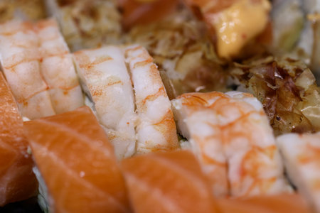 Set of sushi rolls with salmon and shrimps, japanese traditional foodの写真素材