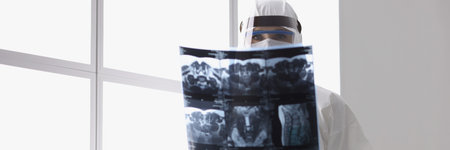 Young female medical worker with resultの写真素材