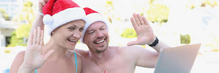 Wear festive santa claus hats