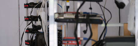 Rows of cryptocurrency mining equipment on farmの写真素材