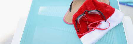 Santa Claus hat and accessories for swimming in the poolの写真素材