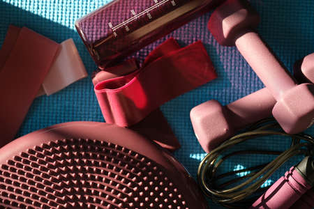 Sports accessories set for home fitness dumbbell jump ropeの写真素材