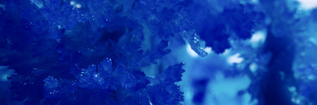 Closeup of blue shiny crystal abstract backgroundの写真素材