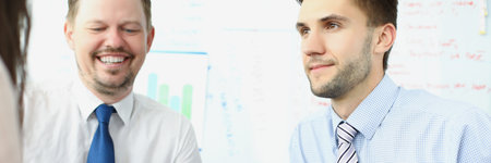 Group of business people with financial papers meet to solve problems