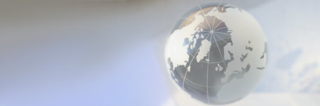 Grey glass world globe, round shaped earth miniature with continents