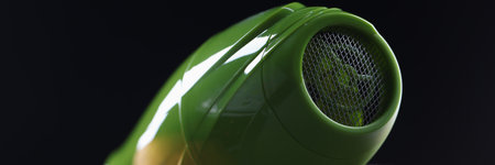 Person holds hair dryer back view and shows metal mesh covering inside of deviceの写真素材