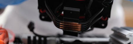 Computer technician installs computer cooling system closeup