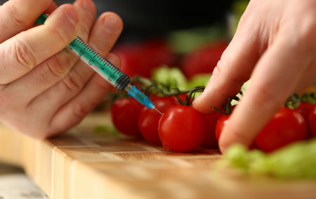 Cook in kitchen introduces secret ingredientの写真素材