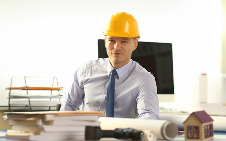 Young Civil Builder Working on Building Sketch