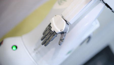 White automated arm of computer robot in productionの写真素材