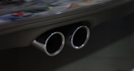 Closeup of metal exhaust pipe of sports carの写真素材