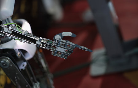 Robot hand pointing with index finger and touching gesture