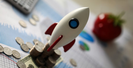 White rocket on coinsの写真素材