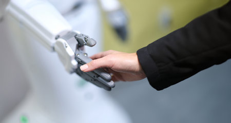 Human and robot handshake, technology of the futureの写真素材