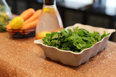 Diverse Fresh Herbs and Ingredients That Enhance the Kitchen Counters Visual Appealの写真素材