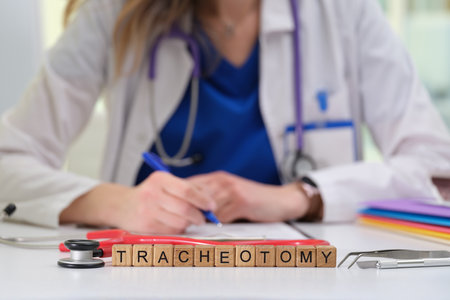 A Medical Professional Provides an Explanation of the Tracheotomy Surgical Procedureの写真素材