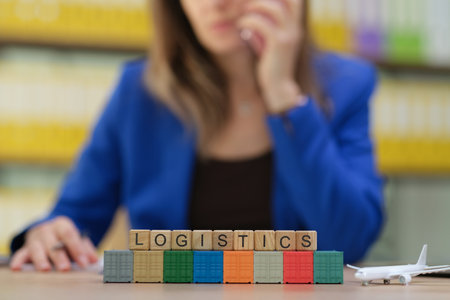 A dedicated Professional Woman specializing in Logistics Management and Cargo Blocksの写真素材