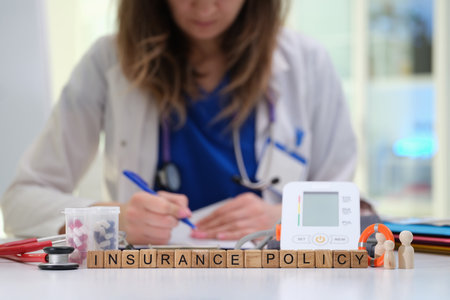 Healthcare Professional Conducting a Detailed Review of an Insurance Policy Documentの写真素材
