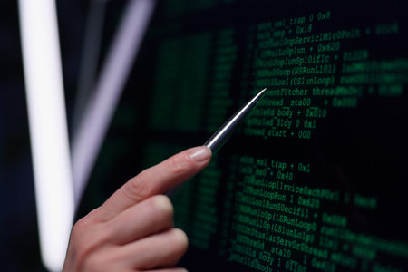 Expert hand gestures over glowing green code in a high-tech environment at night revealing secrets...