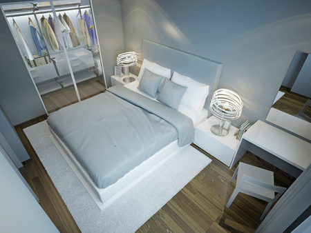 Light blue bedroom with wardrobe. Dressed bed with blue and white pillows on snowy white carpet in contemporary bedroom. 3D renderの写真素材