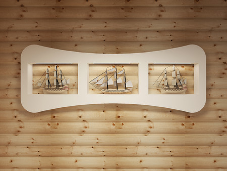 White shelves with niches with models of sea vessels on the log wall. 3D render.の写真素材