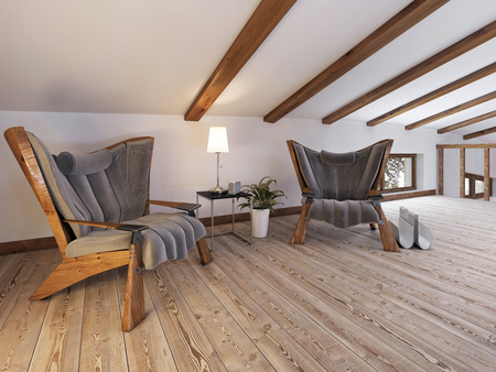 The attic floor with a seating area with designer chairs and a low table lamp in a loft style. Ceiling with wooden beams and white painting. 3D render.の写真素材