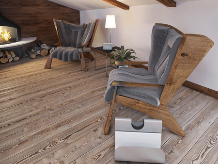 Comfortable seating area of the two chairs by the fireplace in the attic in the loft style. 3D render.の写真素材