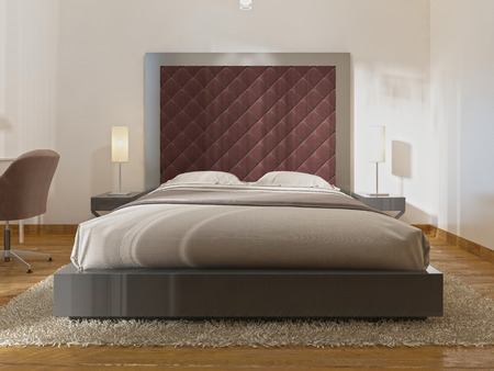 Luxurious one double bed in the hotel room in art Deco. A large padded headboard and bedside tables with table lamps. 3D render.の写真素材