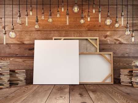 Canvas for paintings mockup poster stands at the wall. Hanging light bulb over the table and painting mockup poster. The decor book. 3D render.の写真素材