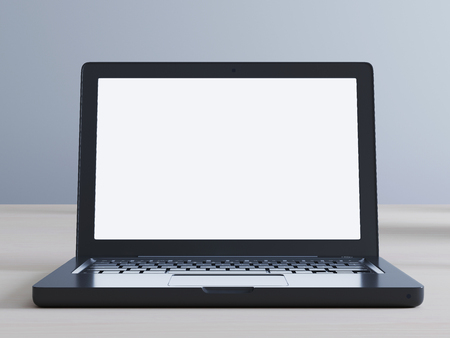 3d rendering of laptop with a white screen mockup on a gray background.の写真素材