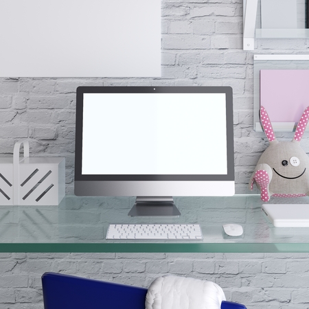 Mockup monitor on a glass table with a children's decor hipster style. 3D render.の写真素材