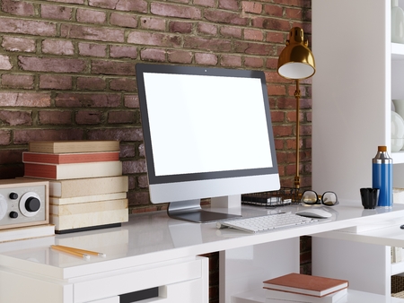 mockup monitor on white desktop background on a red brick wall. 3D render.の写真素材