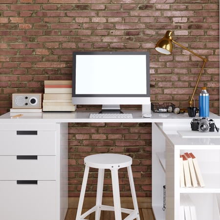 mockup monitor on white desktop background on a red brick wall. 3D render.の写真素材