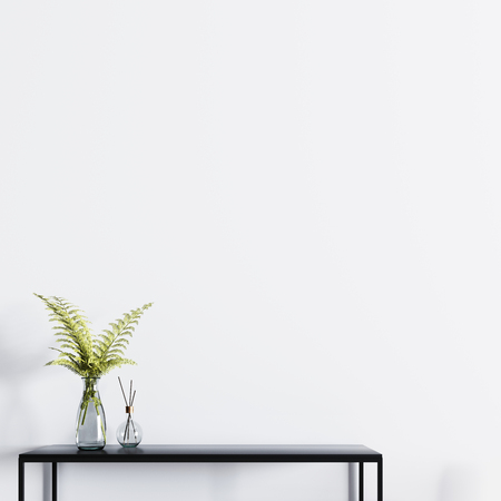 Empty wall for mockup poster with table and plant in a glass vase. 3d rendering.の写真素材
