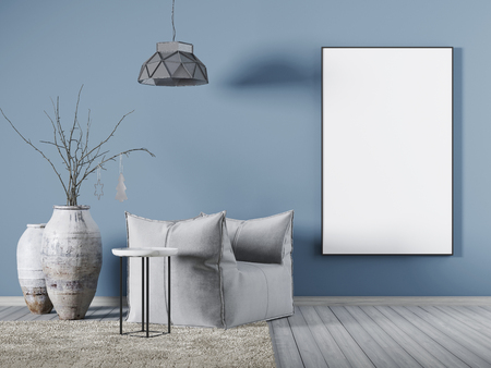 Mock up poster on blue wall in living room whit fabric armchair, a coffee table and big vase. 3d renderingの写真素材