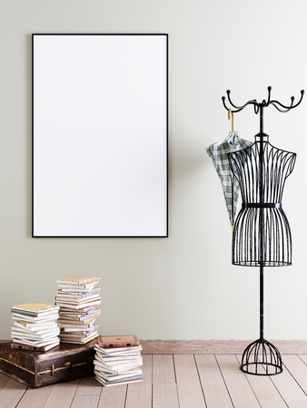 Mock up poster frame in interior with decorative hanger and an old suitcase with books. 3D renderingの写真素材