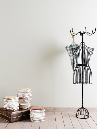 Empty wall for mockup in interior with decorative hanger and an old suitcase with books. 3D renderingの写真素材