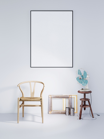 Mock up poster frame with wooden chair and air fan in a white wall background dark modern interior, 3D renderingの写真素材
