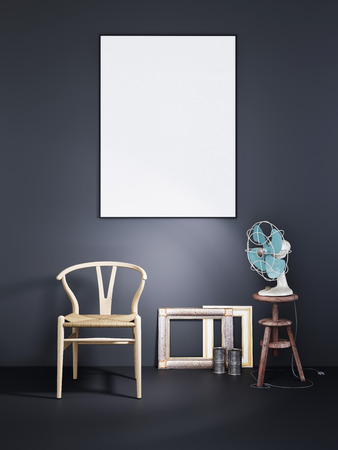 Mock up poster frame with wooden chair and air fan in a blac wall background dark modern interior, 3D renderingの写真素材