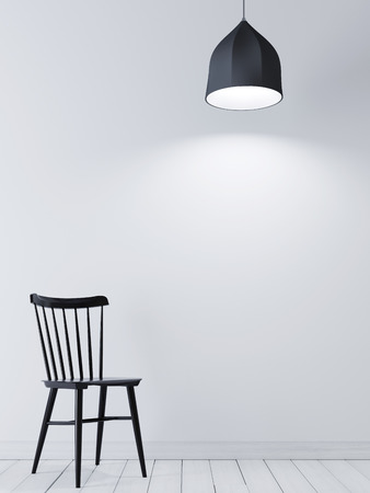 Mock up poster frame on the white wall with black chair and lamp in minimalist interior. 3D renderingの写真素材