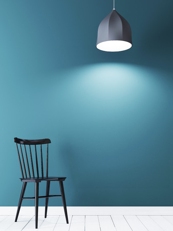 Mock up poster frame on the blue wall with black chair and lamp in minimalist interior. 3D renderingの写真素材