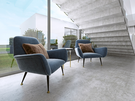 Two modern armchairs by the window under the stairs. 3D rendering.の写真素材
