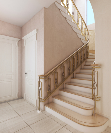 Staircase in the interior of a private house in a classic design. Wooden steps with gilded forged rails.の写真素材