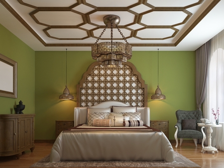 East bedroom, wooden headboard and green walls. TV unit, dressing table, armchair with coffee table. 3D rendering.の写真素材