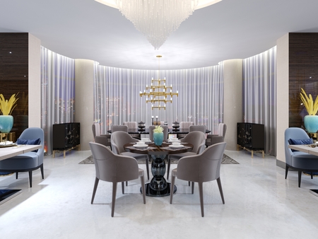 Modern round table in the hotel restaurant, for four persons, with leather chairs and a served wooden table. A table near a large panoramic window. Evening lighting. 3d rendering.の写真素材