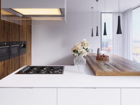 Technological modern kitchen in a minimalist style with a new generation of appliances. Hob, illuminated glass hood, ceiling lights, bar countertops, chairs and d?cor. 3d renderの写真素材