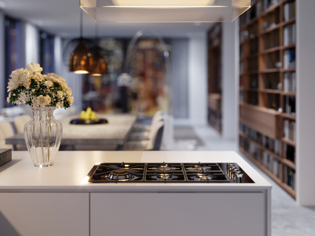 Vase of flowers on the kitchen countertop in the evening light. Modern kitchen in contemporary style. 3d rendering.の写真素材