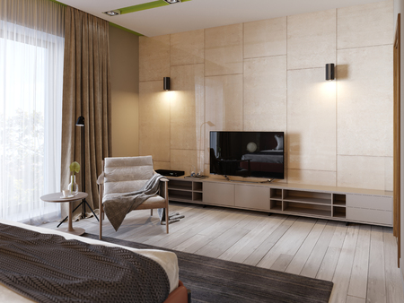 Modern TV stand with shelves and a TV over on the wall of glossy panenley beige color. Bedroom with an armchair and TV stand. 3d renderingの写真素材